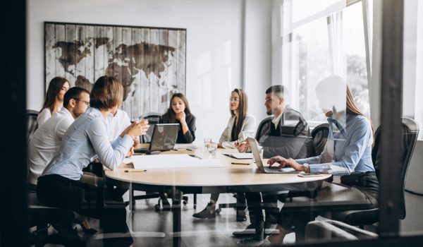 group-people-working-out-business-plan-office